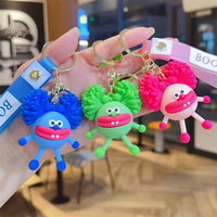 E-Perm-Frisur Monster-Gummi-Schlüsselanhänger Lustige Puppe Auto-Schlüsselanhänger Taschenanhänger Hergestellt in Guangdong Modell 236489