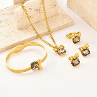 Ensemble de bijoux tendance pour femmes en acier inoxydable 316 et cristal, nœud papillon en strass, collier, bracelet, boucles d'oreilles, bague - plaqué or 18 carats