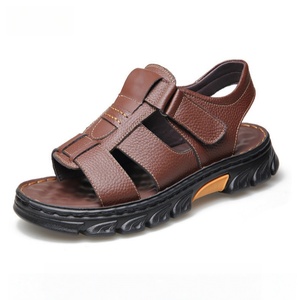 Sandali da <span class=keywords><strong>uomo</strong></span> in vera pelle, antiscivolo, con <span class=keywords><strong>suola</strong></span> spessa, <span class=keywords><strong>scarpe</strong></span> estive casual, con cinturino regolabile, <span class=keywords><strong>scarpe</strong></span> da passeggio piatte traspiranti per esterni - Product Image 1
