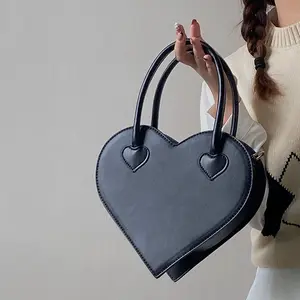 Special heart-shaped bag women's new fashion simple handbag retro casual black shoulder bag lady