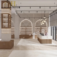 Vitrine de présentation de parfums avec mur décoratif en arche islamique pour comptoir de magasin