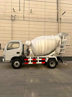 Mini-dumper sur chenilles avec moteur EURO5 EPA, commande hydraulique et poste de commande assis, pour le malaxage du béton