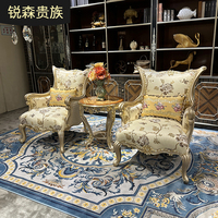 Fauteuil décontracté en bois massif sculpté, style européen, avec tissu de luxe, idéal pour balcon et villas de prestige