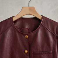 Veste courte en cuir d'agneau véritable pour femme, col rond mat, boutons dorés en relief, poches obliques sur la poitrine, coupe ample, style vintage