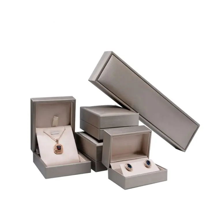 ジュエリーボックス用カスタムロゴ品質ゴールドシルバーパッケージパッキングリングブレスレットネックレスペンダントジュエリーボックス