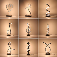 Lampe de chevet moderne à commande tactile LED en forme d'arc pour hôtels Lampe spirale USB 5V