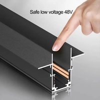 Éclairage sur rail magnétique 48V moderne personnalisé de haute qualité Grille d'inondation encastrée en aluminium Système d'éclairage magnétique suspendu