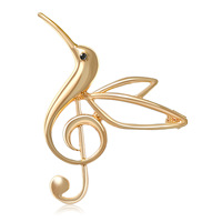 Broche classique en alliage plaqué or moulé sous pression, motif oiseau ajouré et clé de sol, pour la vente en gros de bijoux