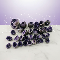 Vente en gros de grappes d'œufs d'améthyste polies et de formes de grottes de cristal pour l'art DIY, les objets de collection et les cadeaux de guérison