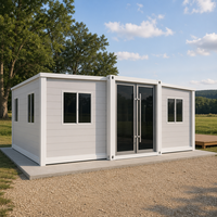 Maison conteneur modulaire pliable à structure blanche pour le glamping et l'hébergement temporaire