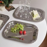 Moderne retro roestvrijstalen dinerborden, rechtstreeks van de fabriek, voor kantines en restaurants, met een gelukkig bloemenontwerp voor fruit- en snackborden.