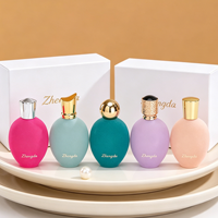 Flacon de parfum en verre floqué transparent de 50 ml avec pulvérisateur à pompe pour cadeaux de mariage et emballages en gros, boîtes de parfum en stock