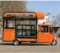 Tricycle électrique orange, camion de restauration mobile, chariot de vente de nourriture entièrement équipé, cuisine mobile pour la vente de rue