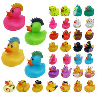 Jouets de bain exclusifs pour bébés en forme de canard en caoutchouc de 2 pouces, motifs uniques et originaux, vente en gros, mini et petits