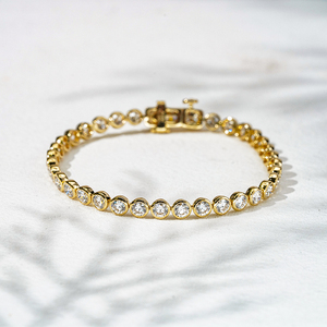 Pulsera de tenis Starsgem de oro amarillo de 10k con diamantes de laboratorio sueltos DEF VS de corte redondo de 3.8mm y engaste de bisel - Product Image 1