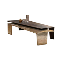 Table basse Vintage en acier inoxydable, or et métal noir irrégulier, style Vintage exotique