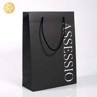 EN PACK Logo imprimé personnalisé Boutique de papier noir de luxe Emballage de vêtements Sac à provisions cadeau Sac en papier avec poignées en ruban