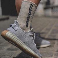 Chaussettes Jacquard pour homme et femme, socquettes unisexe, tendance, en coton, avec Logo imprimé, de haute qualité, pour le Basketball, vente en gros, offre spéciale