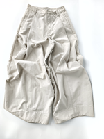 Pantalon plissé ample à jambes larges en coton froissé avec poche triangulaire arrière, coupe décontractée pour femme