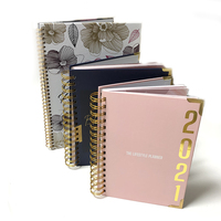 Libros personalizados A4 A5 impreso alambre dorado bienestar autocuidado diario suministros nota libro impresión planificador diario cuaderno con logotipo
