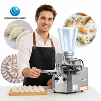 Machine automatique chinoise en acier inoxydable pour la fabrication de raviolis et de gyozas, portable, usage commercial, avec moteur