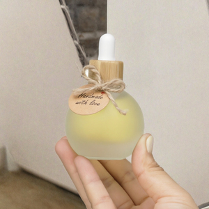 ขวดแก้วทรงกลมแบบหนา 40 มล. ขวดเซรั่มแบบขุ่นพร้อมฝาไม้ไผ่/ไม้  แบบหยด รุ่น CT LH สำหรับน้ำมันหอมระเหยและเครื่องสำอาง - Product Image 3