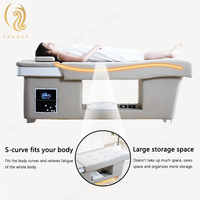 Lit de massage électrique pour le cuir chevelier avec design ergonomique incurvé