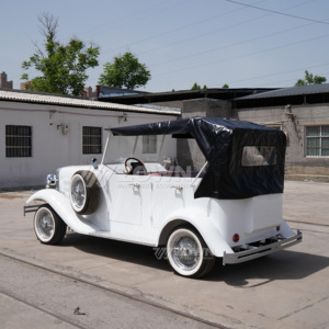 Voiturette électrique vintage blanche avec toit souple noir et fenêtre arrière pour mariage ou tournage de films - Product Image 6