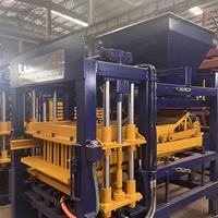 Machine à blocs automatique robuste QT4-15B pour la fabrication de briques creuses en ciment et de blocs de pavé