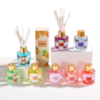 Rafraîchissement d'air de maison de luxe personnalisé pour ensemble de diffuseur de roseaux capacité de 50ml et 100ml huile de parfum de série de fruits en boîte