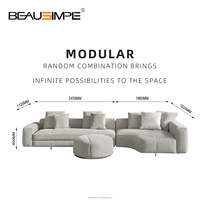 Canapé modulable italien moderne en tissu personnalisable, au design minimaliste et élégant pour salon.