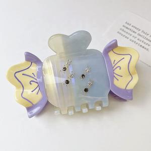 กิ๊บติดผมทรงลูกกวาดน่ารัก สีสันสดใส ประดับคริสตัลและเพชรเทียม ผลิตจากอะซิเตท เป็นมิตรต่อสิ่งแวดล้อม เหมาะสำหรับใช้ในชีวิตประจำวัน แฟชั่นทันสมัย - Product Image 4