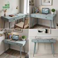Meja Tulis Modern Warna Biru Muda Ramah Lingkungan dari Kayu dengan Dua Laci Penyimpanan Kaki Runcing untuk Kamar Tidur atau Kantor Rumah