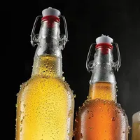 Botella de cerveza abatible de vidrio de 16oz con tapa de sellado superior abatible utilizada para bebidas carbonatadas CommScope té segunda fermentación agua