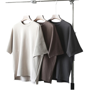 เสื้อยืดคอตตอนหนานุ่มสำหรับฤดูร้อน เสื้อยืดแขนสั้นคอตตอนสำหรับผู้ชายและผู้หญิง เสื้อคู่รักคอตตอนสีขาวล้วนทรงหลวมแขนสั้น - Product Image 1