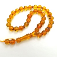 Prix compétitif Tailles multiples Religieux Jaune Rond 33 Perles Chine Perles de prière avec insectes Perles en résine Fourmis Chapelet