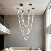 Luminaire suspendu personnalisé de luxe en cristal pour hôtel, villa, hall duplex, salon, escalier