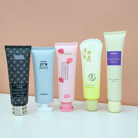 Tubes de crème pour les yeux en plastique à capuchon rose, tubes souples mignons, tubes de brillant à lèvres de luxe avec emballage personnalisé pour marque privée