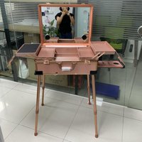 Étui de maquillage de train à la mode avec fermeture ouverte LED miroir léger roulant chariot-élégant étui de beauté à pattes boîte de maquillage haut-parleurs