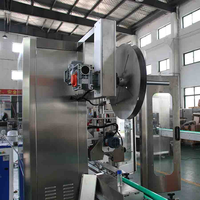 Machine d'étiquetage rétractable personnalisée pour bouteilles de jus et d'eau, machine de bandage rétractable automatique pour bouteilles de vodka