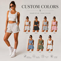 Ensemble décontracté deux pièces tendance streetwear pour femme, été 2026, avec logo personnalisé, débardeur court rayé et short à fermeture éclair avec ceinture, haute qualité