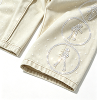 Jean pour homme personnalisé OEM Rock Revival, coupe droite, taille haute double, délavé vintage, effet usé, orné de strass en forme de diamant, en denim évasé