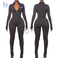 Huili personnalisé de haute qualité deux pièces fermeture éclair haut court et Leggings pantalon de jogging survêtement maigre Gym 2 ensembles tenues pour les femmes