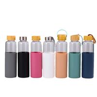 Bouteilles d'eau en verre borosilicate de haute qualité avec manchon en silicone, sans BPA, réutilisables, transparentes, avec couvercle en bambou anti-fuite