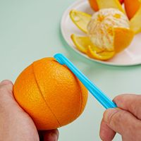 Nouvel éplucheur manuel en plastique pour agrumes et oranges, avec conception à ouverture facile, couleur néon vif – Outil de cuisine pour fruits et légumes
