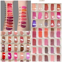 Vente en gros de gloss à lèvres vegan, rouge à lèvres liquide de luxe, haute qualité, longue tenue, rouge à lèvres avec strass, gloss à lèvres diamant avec chaîne pompon