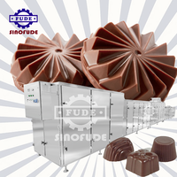 Vente chaude Machine de moulage de chocolat Petite machine de fabrication de chocolat Conche de chocolat Machine de fusion et de remplissage d'huile