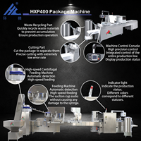 Machine d'emballage sous blister automatique à grande vitesse, écologique et silencieuse HuanChou HXP400 pour seringues, contrôlée par PLC, électrique 380V