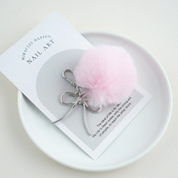 Une variété de porte-clés en forme de boule de lapin Rex populaires, pendentifs en peluche mignons, pendentifs de sac en forme de boule, nouveau style d'hiver