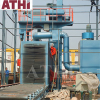 Machine de sablage de tuyaux à convoyeur à rouleaux électrique contrôlée par PLC, marque renommée ATHI Qingdao, avec boîte de vitesses pour nettoyage automatique de l'acier